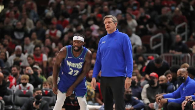 Minnesota Timberwolves guard Patrick Beverley (22) talks with coach Chris Finch
